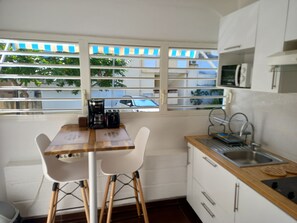 Microwave, stovetop, coffee/tea maker, toaster