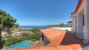 A rooftop pool with a clear view of the sea and surrounding landscape. - Beautiful holiday home, charm and rest. Seaview! (Viggianello)