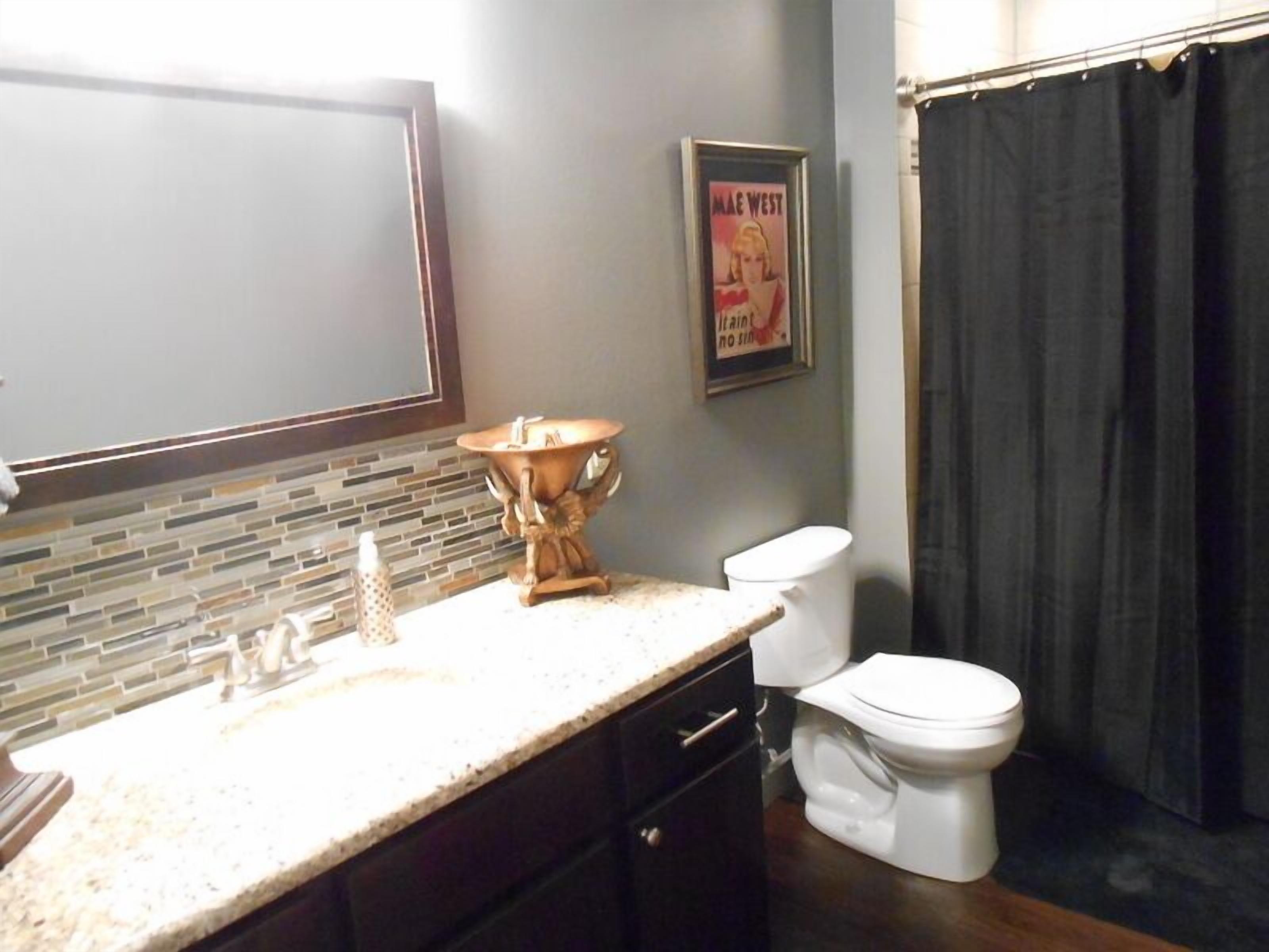 Secluded lakefront estate sleeps 12 just steps from the water