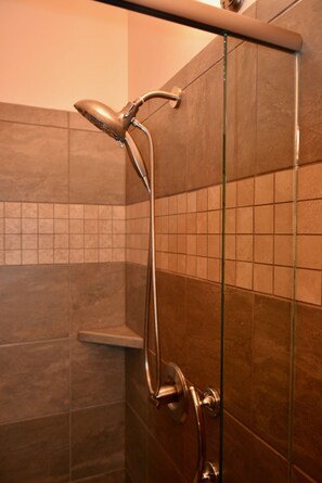 Combined shower/tub, hair dryer, towels, soap