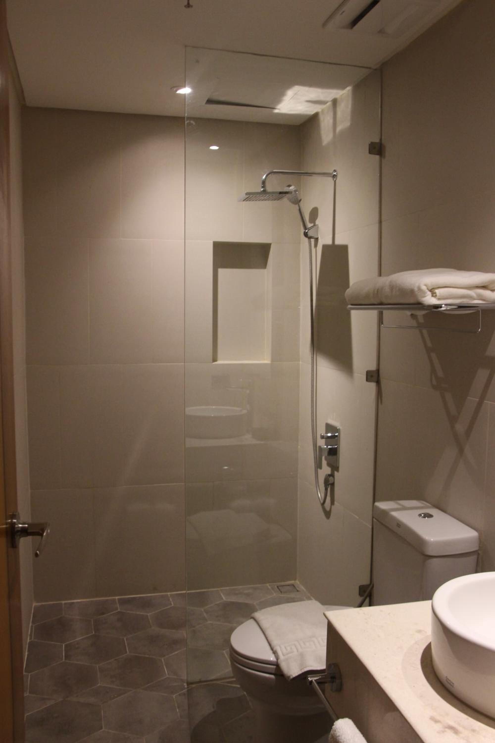 Shower, free toiletries, hair dryer, slippers