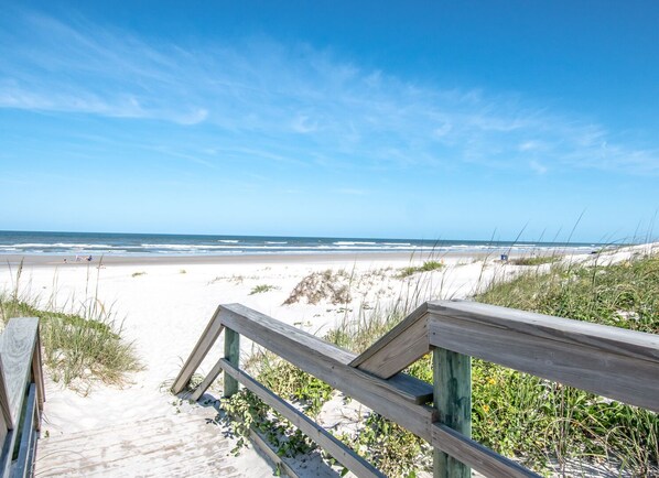 On the beach, sun-loungers, beach towels