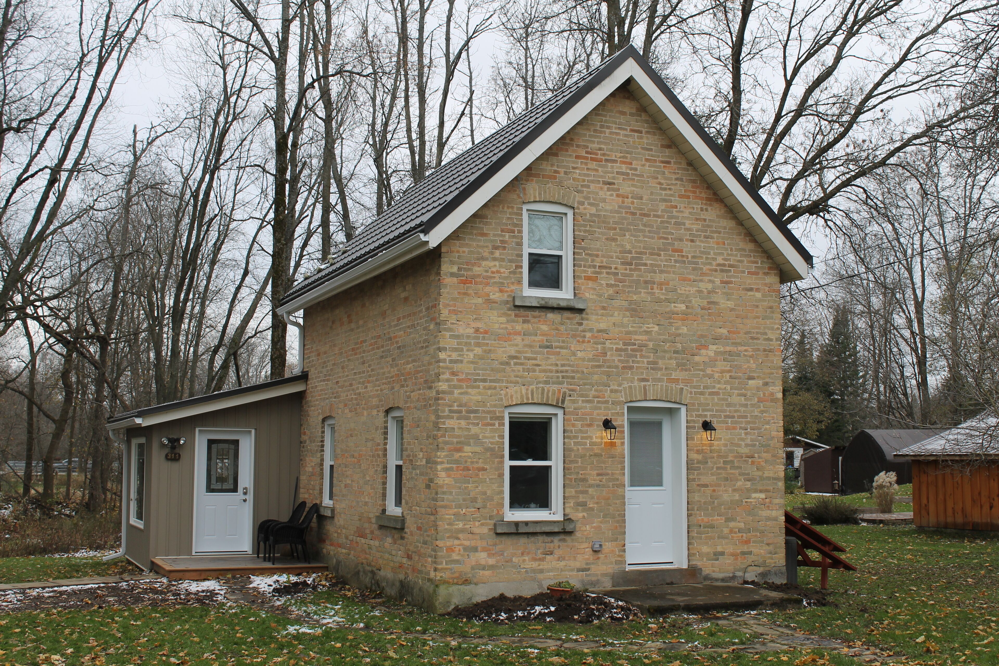 Welcome to Creekside Cottage, made with original Shallow Lake yellow brick