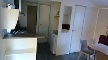Standard Mobile Home, 2 Bedrooms | Private kitchen | Full-sized fridge, microwave, stovetop, high chair