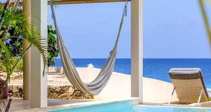 Frente al mar con playa privada | 4 dormitorios, 4 baños
