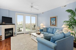TV, fireplace - Stunning 3BR 3BA Ocean Block Unit with Ocean Views! 1/2 Block from the Beach. (Ocean City)