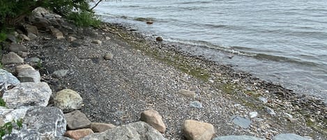 On the beach, sun-loungers