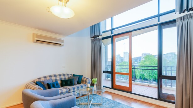 Appartamento, 2 camere da letto | Area soggiorno | TV a schermo piatto