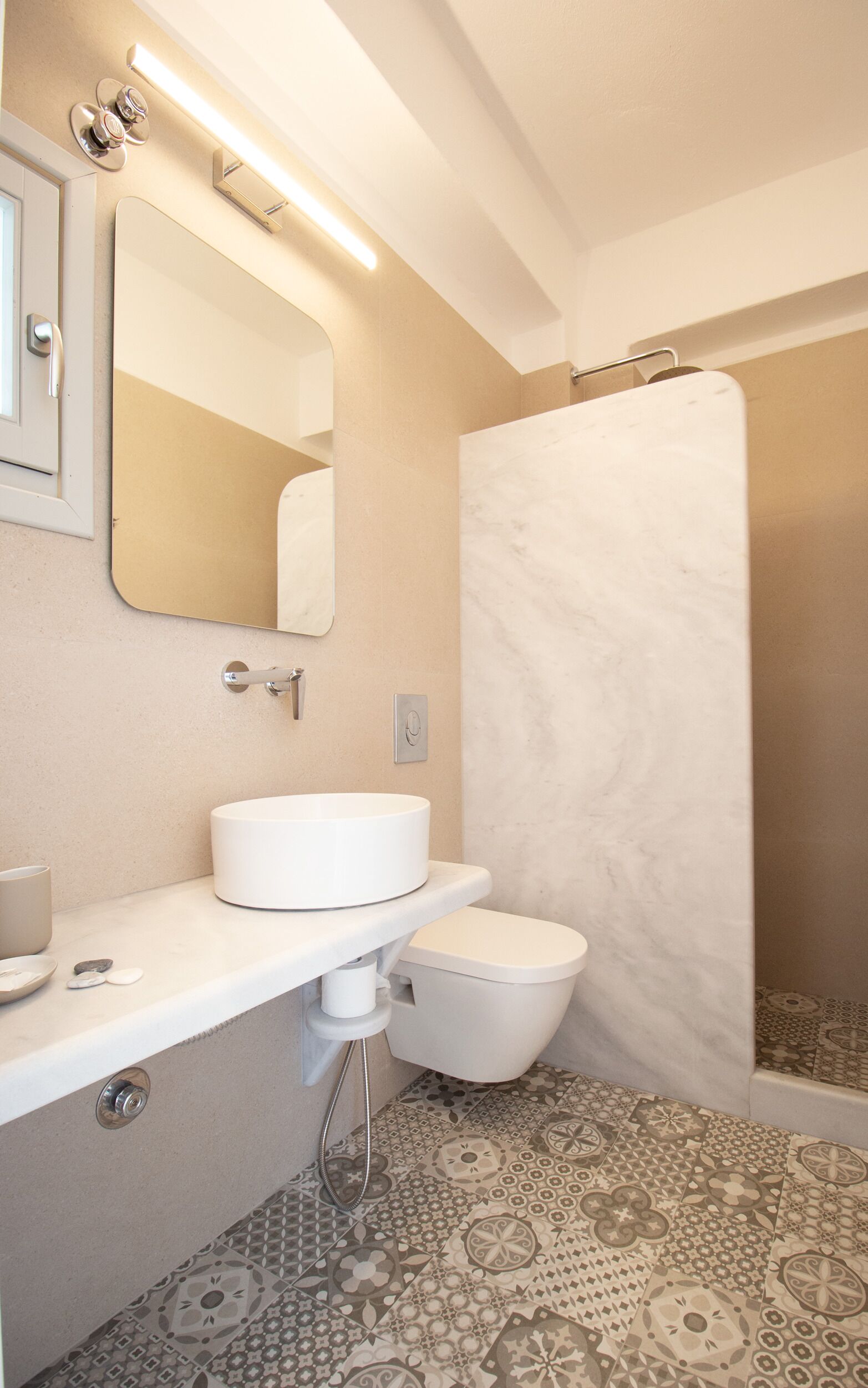 superior studio suite | bathroom | shower, free toiletries, hair dryer, slippers