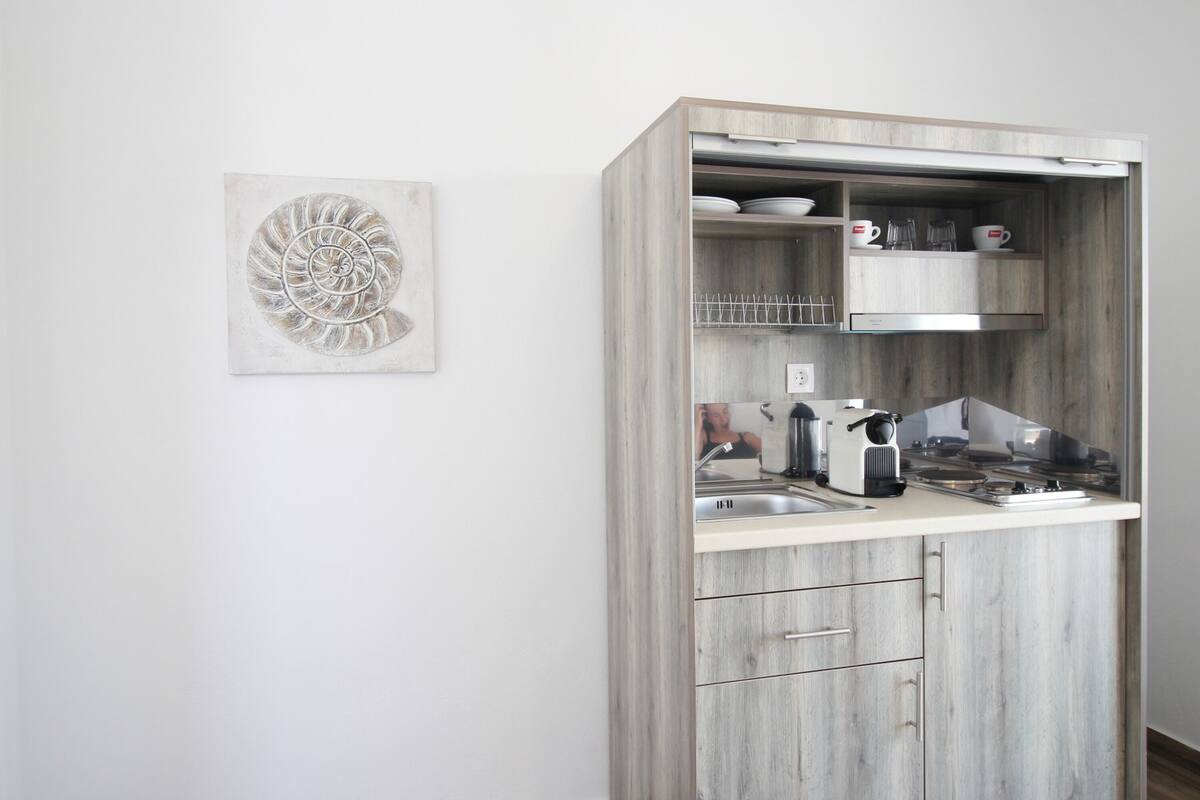 superior studio suite, sea view | 1 bedroom, in-room safe, soundproofing, iron/ironing board