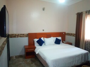 Desk, laptop workspace, free WiFi, bed sheets