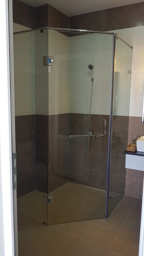 Shower, free toiletries, slippers, towels