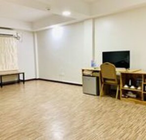 Chambre familiale | Aire de séjour | Téléviseur