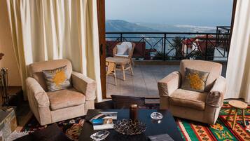 Villa, 4 Bedrooms, Private Pool, Sea View | Living area | Flat-screen TV, fireplace, DVD player, MP3 dock