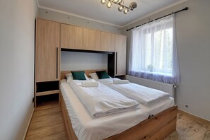 Appartement | 1 chambre, literie de qualité, fer et planche à repasser
