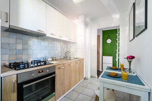 Apartment | Private kitchen | Fridge, oven, stovetop, dishwasher