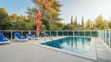 Seasonal outdoor pool, open 7:00 AM to 8:30 PM, sun loungers