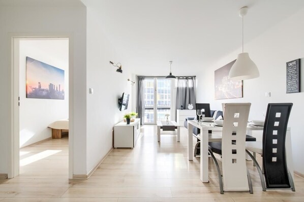 Appartement | Coin séjour | Télévision à écran plat de 40 pouces avec chaînes par câble, télévision