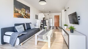 Appartement | Aire de séjour | Téléviseur à écran plat de 40 po avec télévision par câble, téléviseur