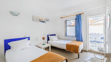 Twin Room, Private Bathroom | Free WiFi, bed sheets
