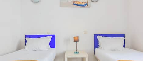 Twin Room, Private Bathroom | Free WiFi, bed sheets