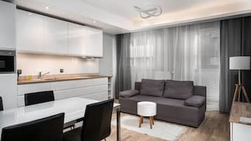 Classic Apartment | Living area | Flat-screen TV