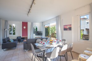 55-inch flat-screen TV with cable channels, TV, DVD player