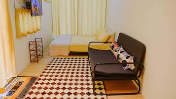 Blackout curtains, iron/ironing board, free WiFi, bed sheets