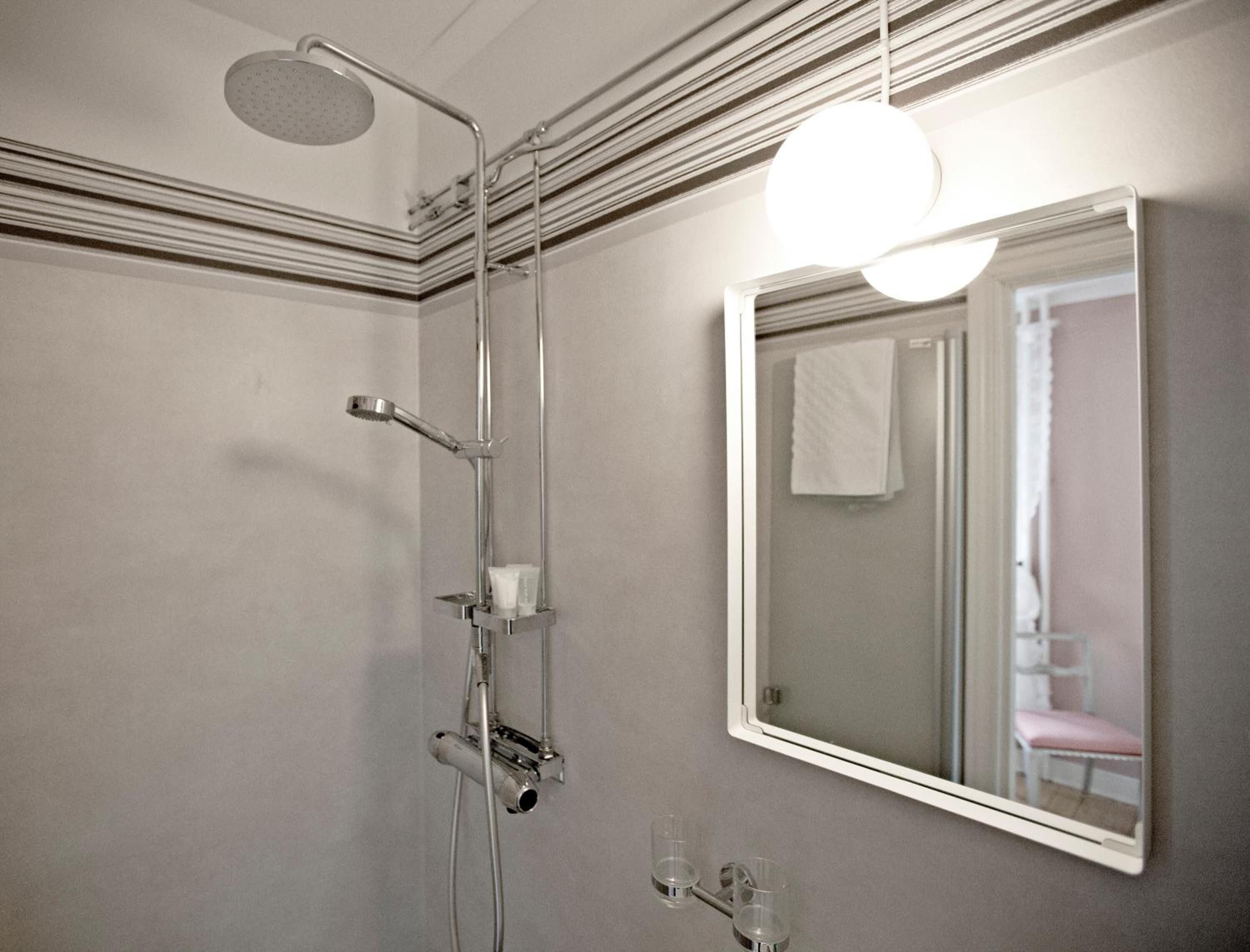 shower, free toiletries, hair dryer, dressing gowns