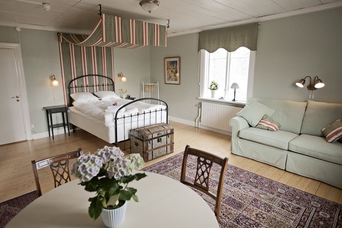 double room, garden view | blackout curtains, cots/infant beds, rollaway beds, free wifi