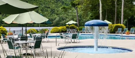 Seasonal outdoor pool, open 10:00 AM to 6:00 PM, pool umbrellas