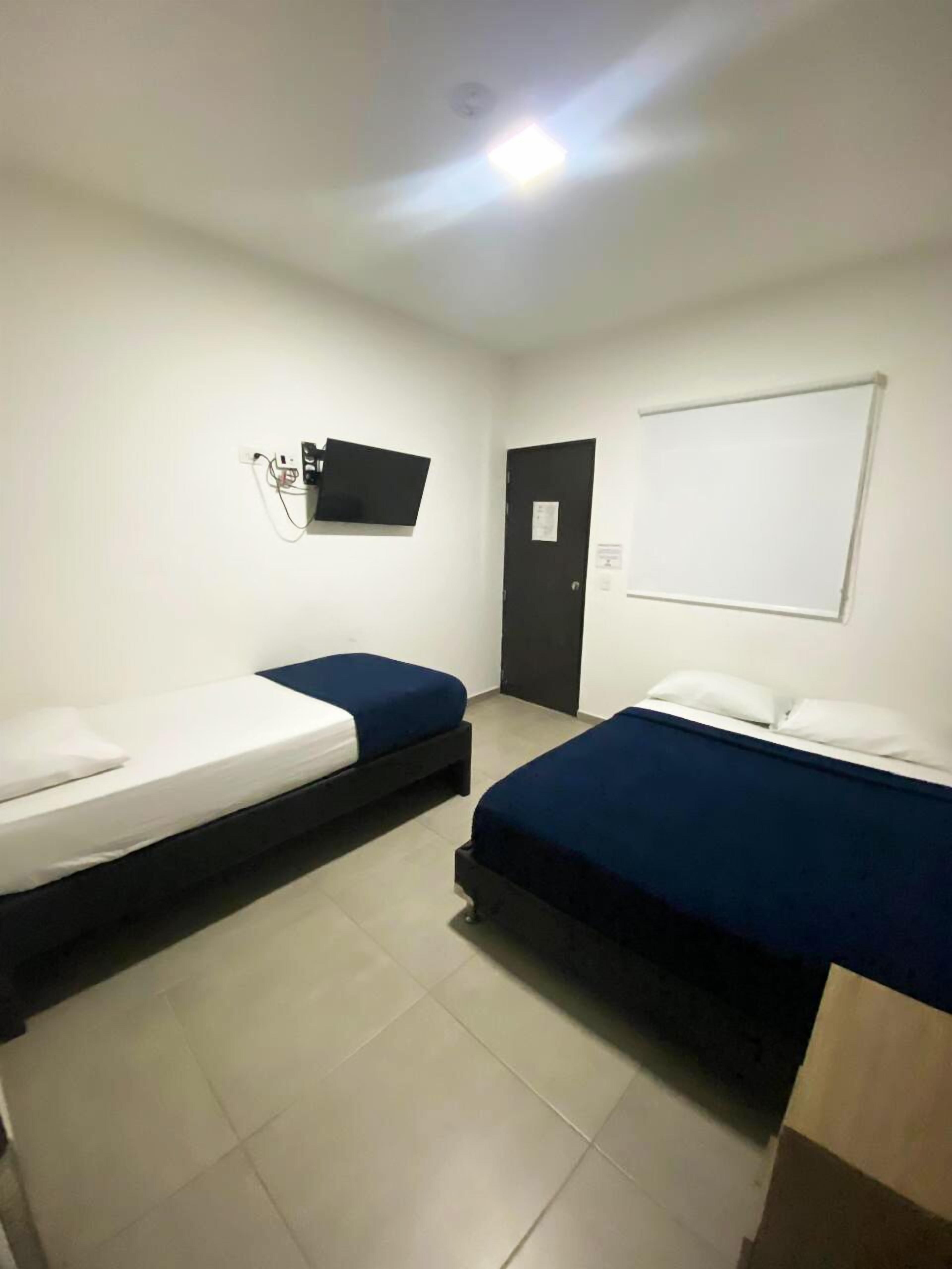 basic triple room | hypo-allergenic bedding, desk, blackout curtains, iron/ironing board