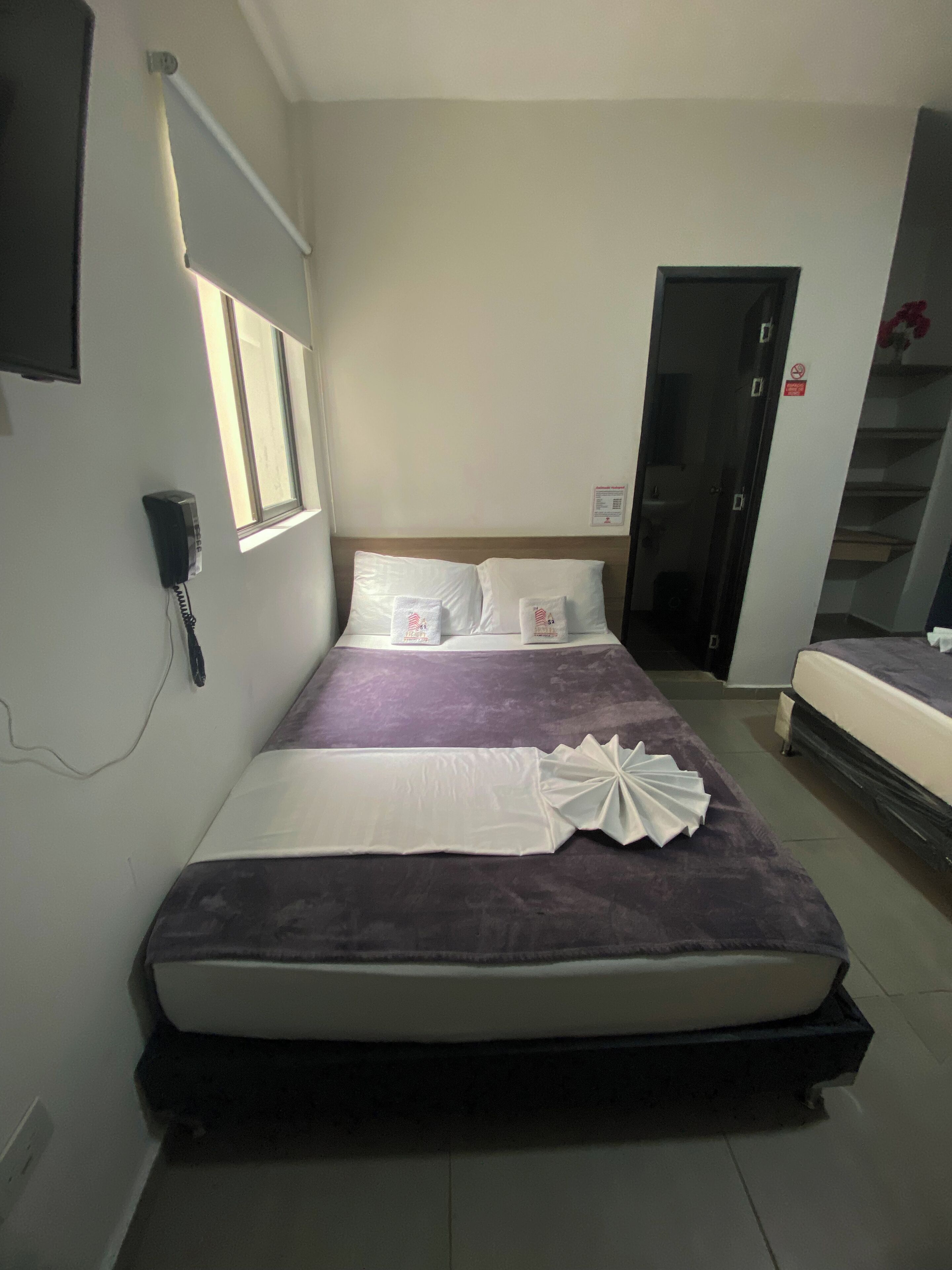 family room, non smoking | hypo-allergenic bedding, desk, blackout curtains, iron/ironing board