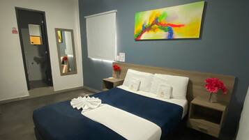 Hypo-allergenic bedding, desk, blackout curtains, iron/ironing board