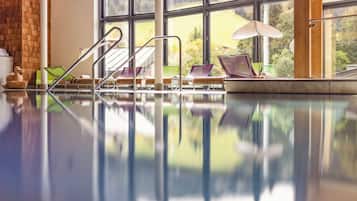 Indoor pool, open 8:00 AM to 8:00 PM, pool loungers