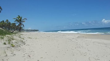 On the beach, sun-loungers, beach towels