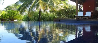 Scenic Waterfront Villa - Overflow  Pool & Tropical Landscape