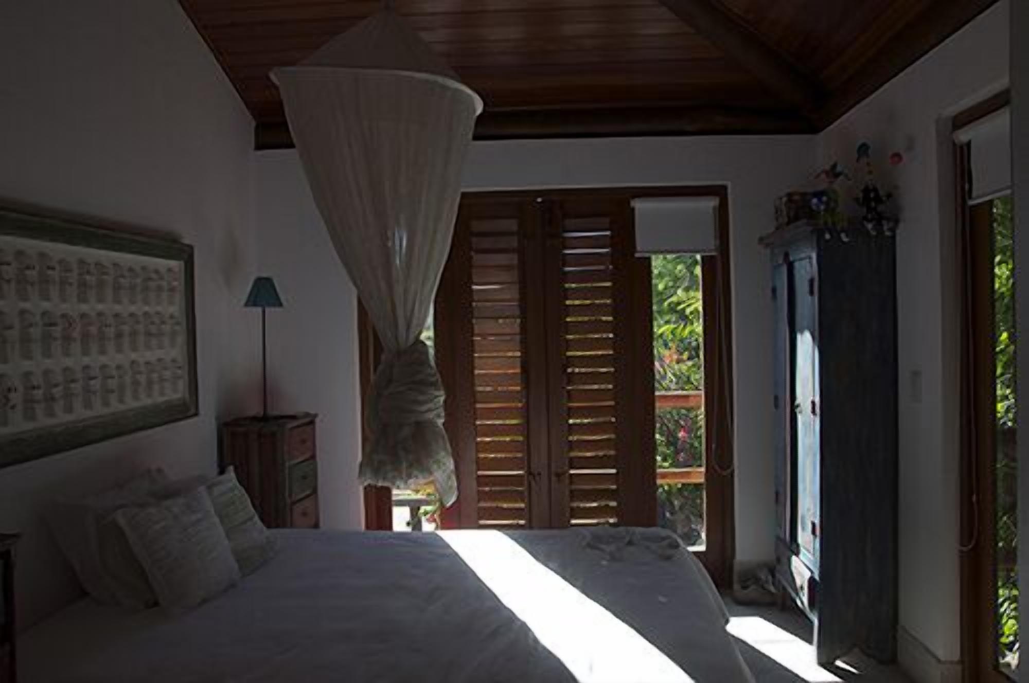 Scenic Waterfront Villa - Overflow  Pool & Tropical Landscape