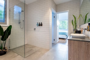 Shower, hair dryer, towels, soap