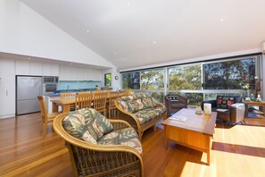 Flat-screen TV, DVD player, table tennis, books