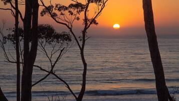 On the beach, sun-loungers, beach towels
