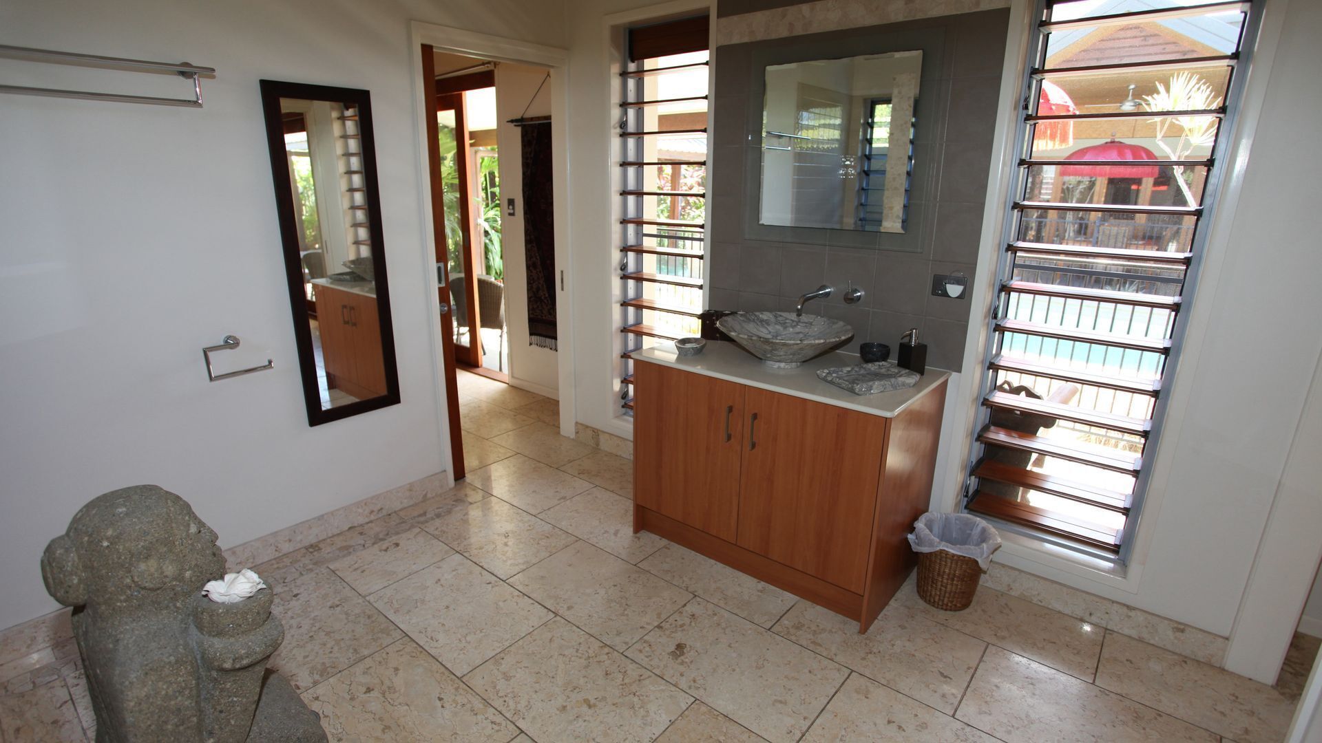 Beachside Bali inspired tropical retreat with large heated Saltwater pool.     \n — image 2