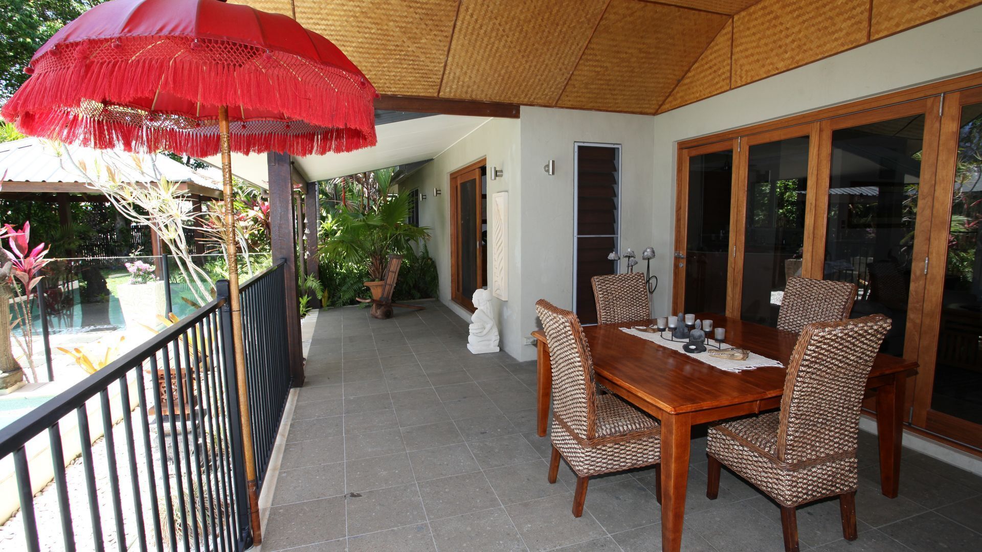 Beachside Bali inspired tropical retreat with large heated Saltwater pool.     \n — image 5