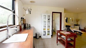 Suite estudio | Área de sala de estar