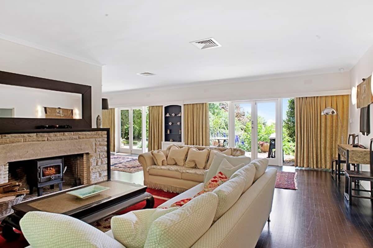 Smart TV, fireplace, books