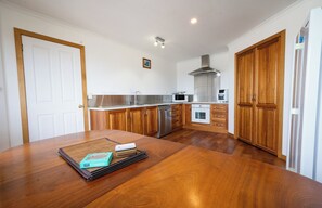 Fridge, microwave, oven, stovetop - St Helens On The Bay apartment 1 (St. Helens)