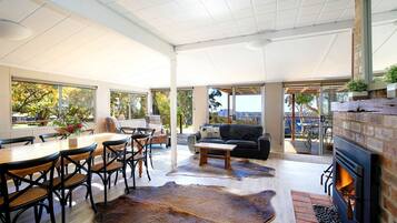 Smart TV, fireplace, DVD player, books