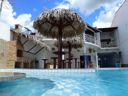 Beautiful house in front of the 'Preguiça' river.