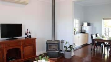Flat-screen TV, fireplace, DVD player, stereo
