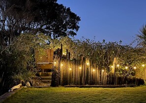 Enjoy a soak in the hot tub surrounded by coastal plantings and lantern lights. A favourite spot at Drifting Sands.